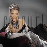 28-04-2004 Joke de Kruijf in Amsterdam, by order of Stage-entertainment. April 28, 2004.

[keywords]Posed, Eyecontact, Smiling, Sofa[/keywords]